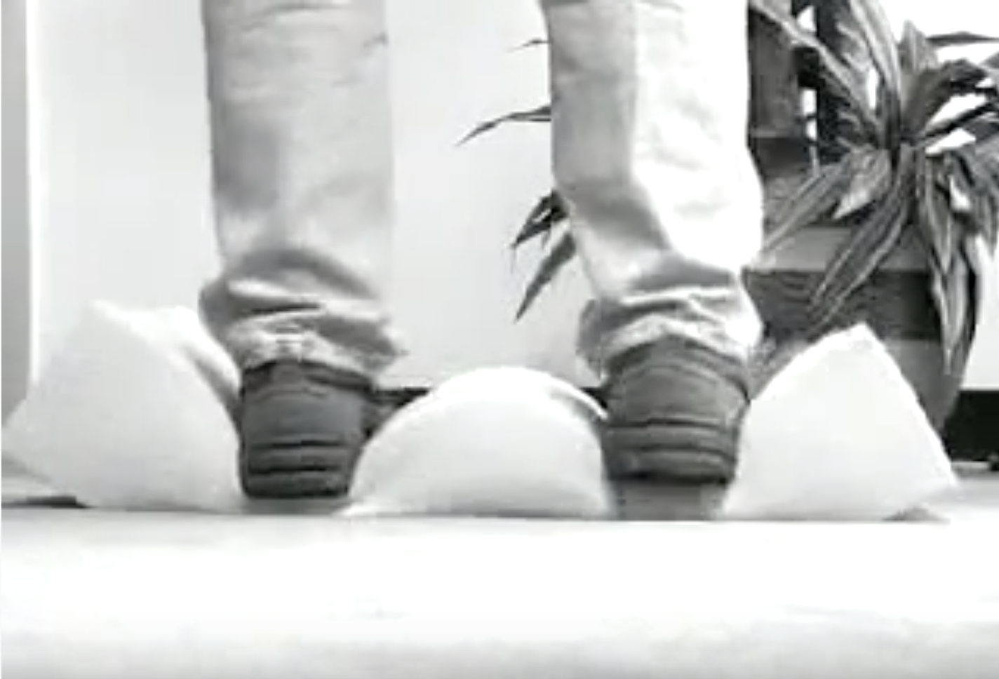 man standing on piece of foam