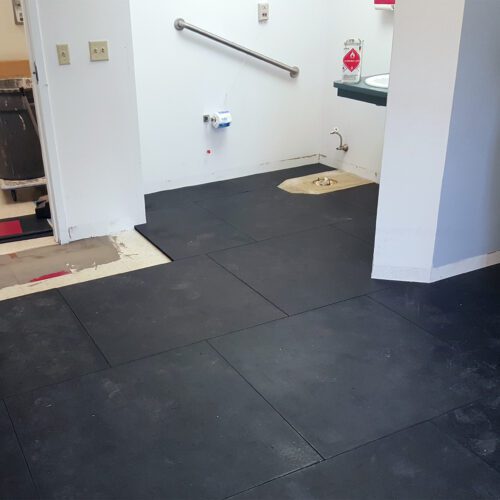 SmartCells tiles laid throughout a bathroom at a senior care center