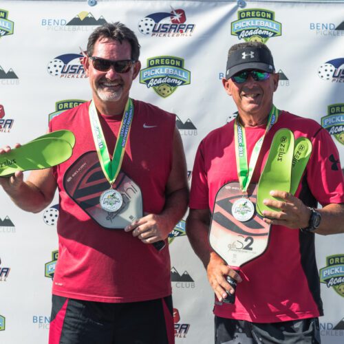 Winners of Pickleball tournament holding Zelus Insoles
