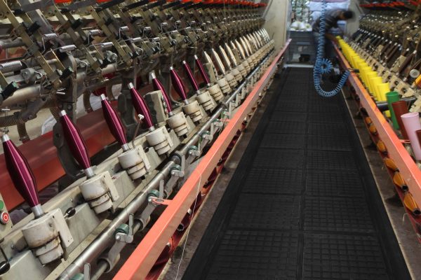Hog-Heaven-III-Comfort-Linkable-Inplace-scaled walkway surrounded by heavy machinery