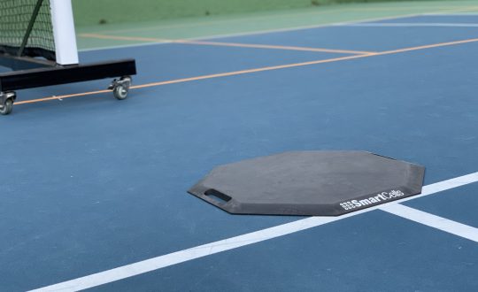 SmartCells Octagonal Mat SmartCells Octagonal Mat being used for ref at a pickleball tournament