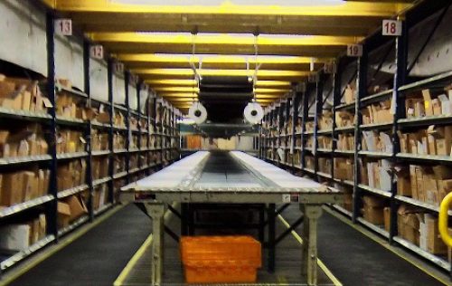 SmartCells Anti-Fatigue Custom Flooring SmartCells Anti-Fatigue flooring wrapped around industrial cutting equipment