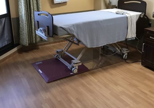 SmartCells Fall Protection Safe Room Hospital bed with SmartCells Flooring used as underlayment