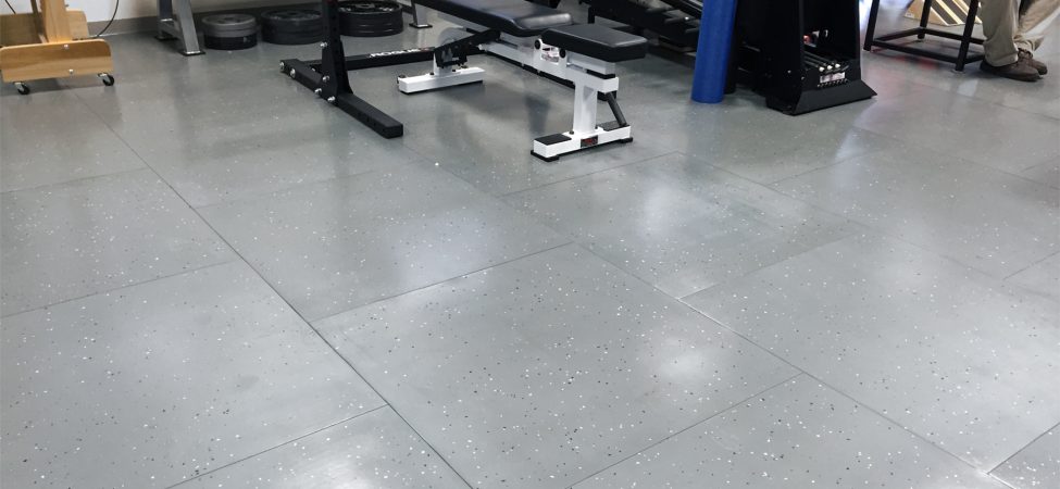 smartcells physical therapy installation Smartcells Physical Therapy flooring with weightlifting equipment