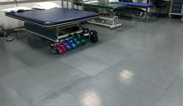 smartcells-training-therapy-chiropractors-01 Chiropractic beds sitting on top of SmartCells flooring