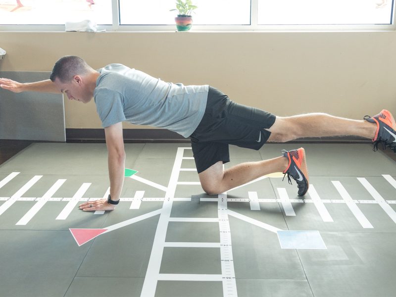 SmartCells Physical Therapy Mat Patient doing exercises on SmartCells Physical Therapy Mat