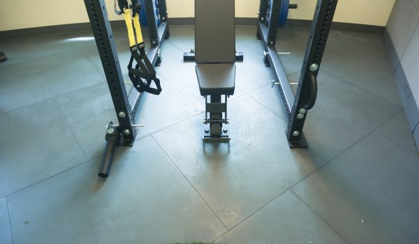 SmartCells Physical therapy installation Weightlifting equipment sitting on top of SmartCells physical therapy flooring