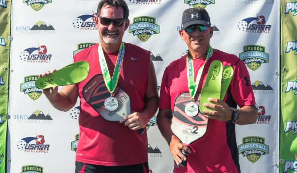 Zelus Insoles Winner Winners of Pickleball tournament holding Zelus Insoles