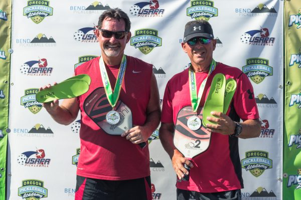 Zelus Insoles Winner Winners of Pickleball tournament holding Zelus Insoles